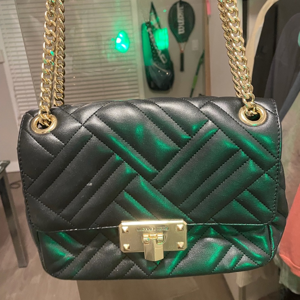 Bags. Brand Michael kors. the average size